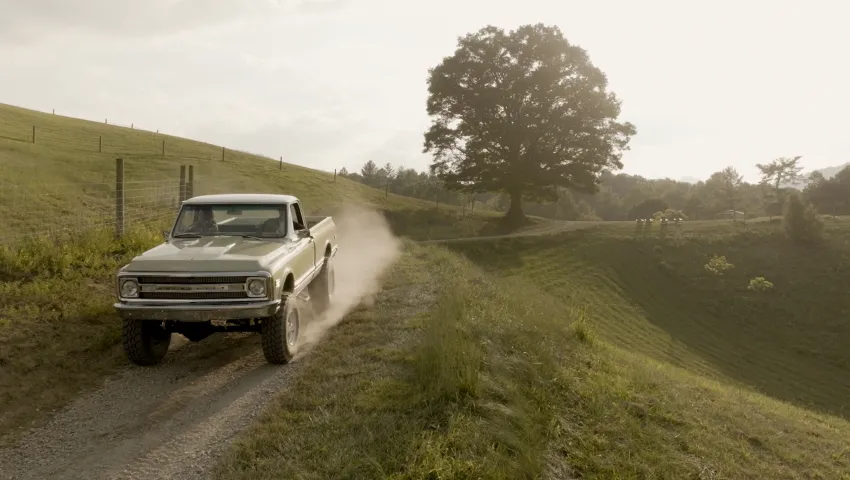 Truck driving on a dirt road